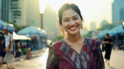 Poster - Woman smiling walking on a city street