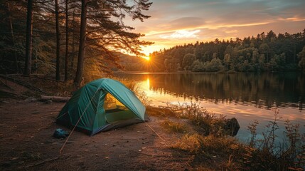 Wall Mural - a picturesque camping scene by a lakeside at sunset, featuring a green tent set up under tall trees 