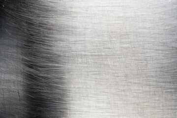 Poster - close-up texture of brushed stainless steel surface with horizontal and vertical scratches, suitable
