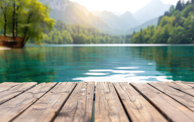 Poster - Tranquil wooden dock overlooking a serene lake surrounded by lush green forest and majestic mountains, bathed in soft morning light.
