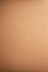Poster - Close-up of corrugated cardboard texture with ribbed pattern. Perfect for background, packaging design, or crafting material.