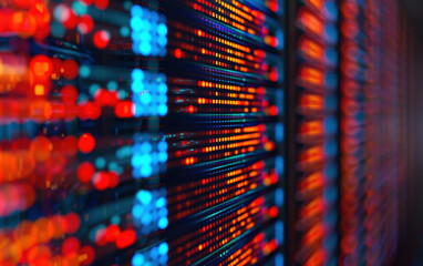 Poster - Close-up of a glowing data server with vibrant lights and intricate details, showcasing modern technology infrastructure in a data center.
