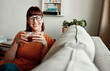 © peopleimages.com - Smile, thinking or woman in home drinking coffee to relax for nostalgia, daydreaming or memory of peace. Happy, inspiration or girl with tea beverage for mental health, insight or reflection of ideas
