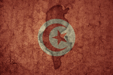 Wall Mural - map and flag of tunisia on a old vintage crack paper background .