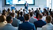© BISO - A business event in a spacious conference hall, with attendees focused on the speaker, training, audience.