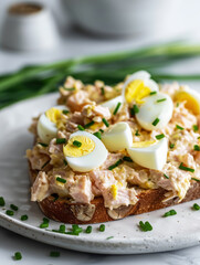 Wall Mural - Tuna salad with boiled eggs spread on a toast 