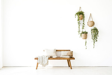 Poster - Minimalist Living Room Decor with Wooden Bench and Hanging Plants