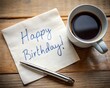 © Tekin - Happy Birthday greeting - handwriting on a napkin with a cup of coffee
