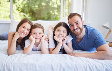 Sticker - Happy family, portrait and relax with bed for bonding, holiday or weekend together at home. Mother, father and children with smile, son and daughter for morning, wake up or lying in bedroom at house