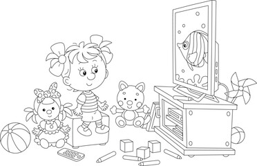 Wall Mural - Happy little girl among her scattered toys watching TV with an animated cartoon film about a funny butterfly fish swimming on a  tropical coral reef, black and white vector illustration