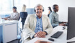 © peopleimages.com - Happy businessman, computer and portrait in call center for client support, telecom and crm in office. Mature agent, lead generation and smile by pc for customer service, telemarketing and contact us