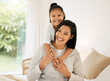 © KayJoint/peopleimages.com - Happy mother, portrait and daughter with hug on bed for bonding, love or embrace at home. Mom, child or young kid with smile for family time, holiday or weekend together in relax or bedroom at house