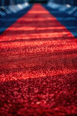 Aufkleber - A long red carpet leads to the entrance of a building, perfect for events or ceremonies