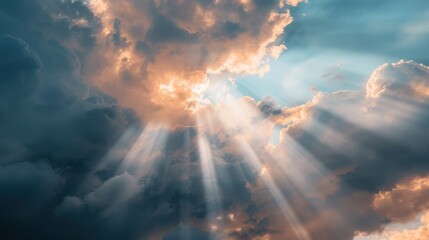 Dramatic sun rays cascade through the gaps in thick clouds, illuminating the sky and creating a striking contrast that evokes feelings of awe, hope, and wonder.