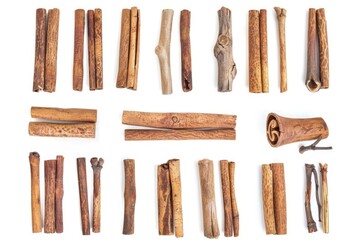 Poster - A bundle of cinnamon sticks placed on a plain white surface