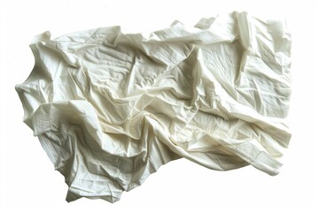 Aufkleber - A pile of white cloth sits on top of a table, ready for use or display