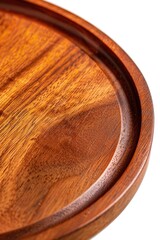 Poster - Close-up shot of a wooden plate on a table, suitable for use in still life photography or as a prop in creative projects
