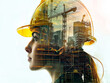 © oneli - young woman in a yellow construction helmet against the background of construction workshop