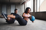 Exercise, couple and fitness with medicine ball outdoor for workout, balance training and core strength of performance. Active, people and muscle challenge, strong biceps and support for gym results