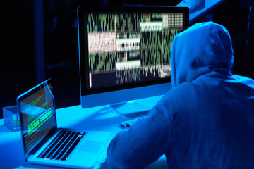 Fototapete - Theft, person or hacker with laptop or screen for cybercrime, malware or phishing for stealing online data. Programmer, night and software update on computer with hacking expert writing algorithm