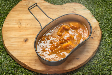 Wall Mural - アウトドアでカレー　Curry with spices at the campsite