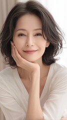 Confident Asian Middle-aged Woman Radiating Beauty in Anti-aging Skincare Advertisement. Elegant Mature Model Smiling at Camera, Showcasing Flawless Skin and Graceful Aging. Empowering Portrait for Fa