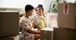 © peopleimages.com - Happy couple, boxes and moving house with apartment, new home and milestone in bonding together. Woman, man and excited in lounge with marriage, support and progress for pride, love and relationship