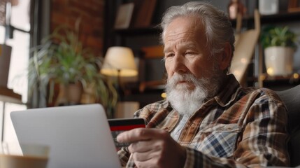 Poster - An older man is using a laptop to pay for something