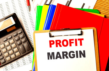 Poster - PROFIT MARGIN text on clipboard with calculator and color folder