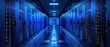 © ZethX - Modern Data Center with Blue LED Lighting and Server Racks in a High-Tech Environment
