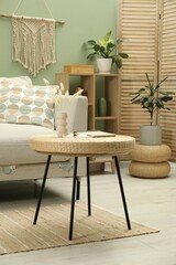 Poster - Comfortable sofa, coffee table and folding screen in stylish living room. Interior design