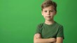 © ChimE - Happy young man beckoning someone to join him. Teenage boy stands against green screen backdrop. Vibrant k footage.
