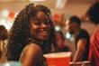 © ChaoticMind - Beautiful woman smiling and having fun at a house party