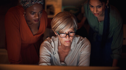 Poster - Business team, tech and collaboration at night in office for company project, diversity and late deadline. Digital agency, computer and strategy in workplace as women with burnout for cooperation