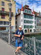© virin - Mature man with camera on the bridge over the river Reuss in the city of Lucerne