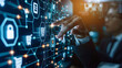 © Mahemud - A businessman touching online banking and network connection icons on a virtual screen, highlighting online payment, shopping, and business digital technology, with a focus on cyber security
