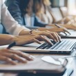 © ThePixLab - Close up view of business people typing on computer laptop while working with her team. business. Photo realistic.