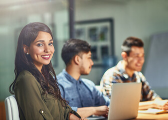 Poster - Teamwork, smile and portrait of business woman at desk in office for creative startup company. Face, happy manager and technology for graphic designer, entrepreneur or worker coworking in meeting