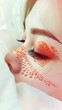 © Raul - Close-up of a woman's face with artistic geometric makeup and long eyelashes, resting peacefully.