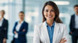 © Bhanuka - Confident businesswoman smiling in a professional office setting. Ideal for showcasing leadership, professionalism, and positivity in the workplace. Perfect for corporate and business-related content.