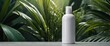 © Ta Sher - White blank tall shampoo bottle with tropical leaves on the green background with copy space, template mockup for cosmetic packaging, product advertising concept.