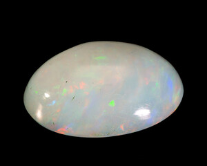 Wall Mural - natural rainbow opal gem isolated on black background