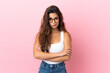 © luismolinero - Young caucasian woman isolated on pink background with unhappy expression