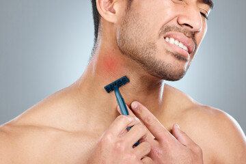 Poster - Man, face and neck shaving injury with self care grooming, healthcare or beard mistake. Pain, model and hair removal accident with cleaning, facial treatment and razor on gray studio background
