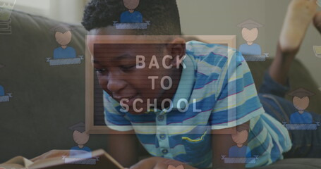 Poster - Image of back to school text over african american boy reading