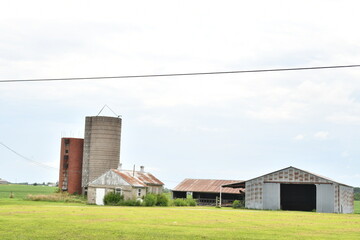 Wall Mural - Barns and Silos in a Farm Field