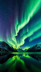 stunning aurora borealis display over a still lake in a mountainous landscape.