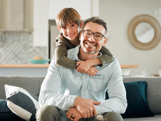 Poster - Sofa, son and hugging father in portrait, peace and single parent love for boy in living room. Daddy, kid and embrace for security on couch for care in childhood, relationship and comfortable home