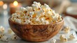 © zooo - Wooden bowl of fresh popcorn, white marble countertop, scattered popcorn kernels, crisp texture, buttery golden hue, close-up food photography, soft natural lighting.