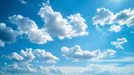Wall Mural - 1. high-resolution image of a clear blue sky adorned with fluffy white clouds on a bright sunny summ